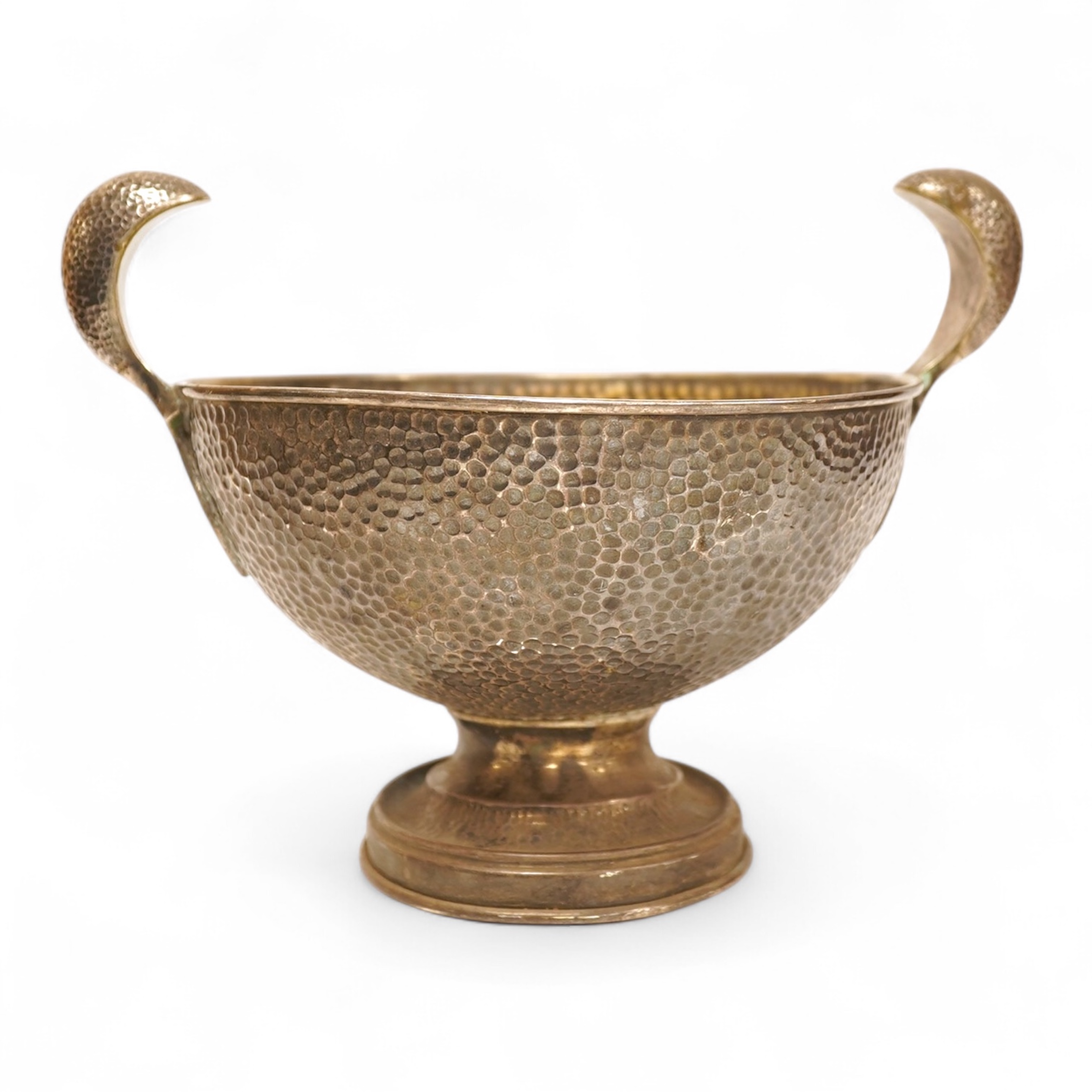 A hammered white metal two handled pedestal bowl, stamped 'Kennedy 925, diameter 18.9cm, 18.1oz.